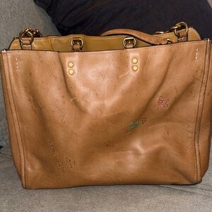 Coach 39 Rogue distressed bag with unique patch work very clean